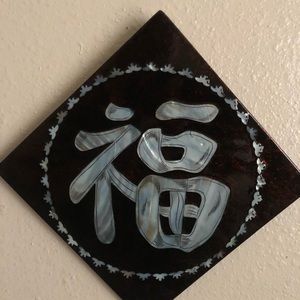 Ceramic Asian plaks.